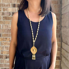 Load image into Gallery viewer, Philippine cultural necklace inspired by the traditional Kulintang gong music of Mindanao.