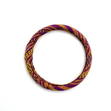Load image into Gallery viewer, Bracelet with purple and gold pattern on a white background