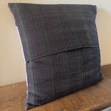 Load image into Gallery viewer, Textured Filipino pillow on a wooden surface with a neutral wall background