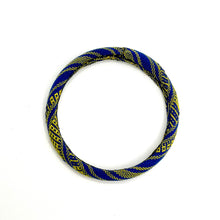 Load image into Gallery viewer, Blue and yellow braided bracelet on a white background