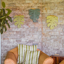Load image into Gallery viewer, Set of 3 handmade macrame monstera leaf wall decor with wicker furniture and two green striped pillows