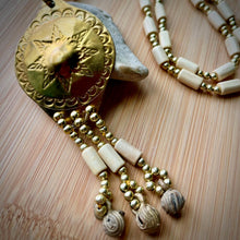Load image into Gallery viewer, Close-up of the Kulintang Gong Necklace pendant with intricate cultural detailing.
