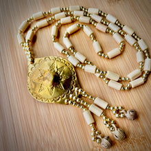 Load image into Gallery viewer, Unique Filipino cultural necklace featuring a gong-inspired pendant design.
