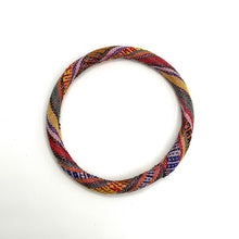 Load image into Gallery viewer, Multicolored braided bracelet on a white background

