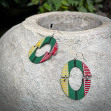 Load image into Gallery viewer, Colorful ethnic Philippines earrings on a stone surface with green foliage in the background
