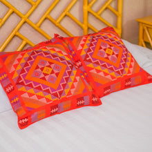Load image into Gallery viewer, Two Filipino tribal print red pillows on resort style bamboo headboard bed from Iba Accessories

