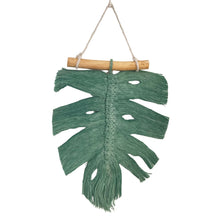 Load image into Gallery viewer, Dark green monstera macrame wall hanging decor on white background
