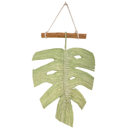 Light green monstera macrame wall hanging decor on white background