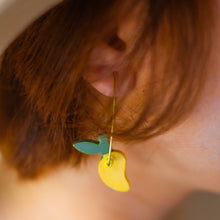 Load image into Gallery viewer, girl earing mango fruit-shaped handpainted wooden dangling earrings
